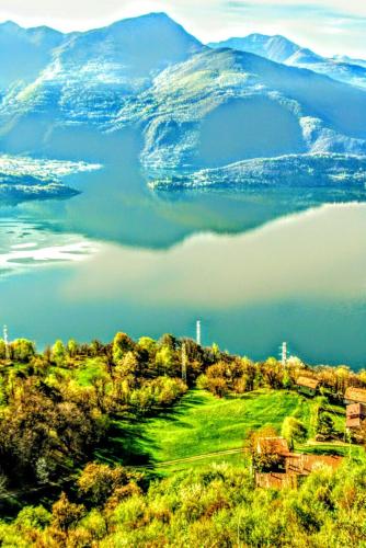 a view of a lake with mountains in the background at Residenza Christian in Gravedona