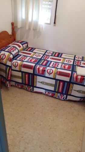 Ein Bett oder Betten in einem Zimmer der Unterkunft Pensión Campomar