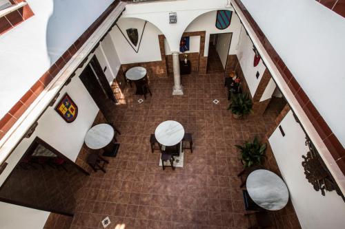 Reštaurácia alebo iné gastronomické zariadenie v ubytovaní Hotel Carlos V Jerez by Vivere Stays