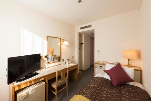 TV a/nebo společenská místnost v ubytování Sky Hotel Uozu