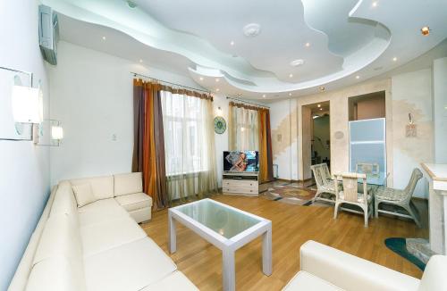 TV a/nebo společenská místnost v ubytování Kiev 24 Apartments