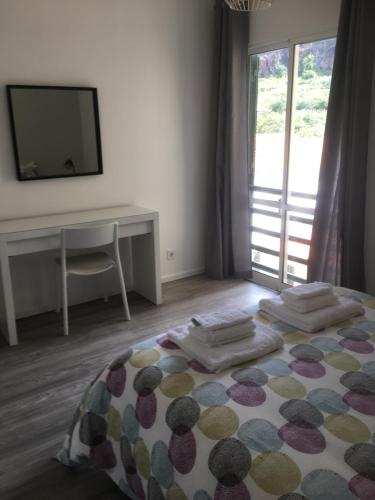 En eller flere senge i et værelse på Feel Funchal