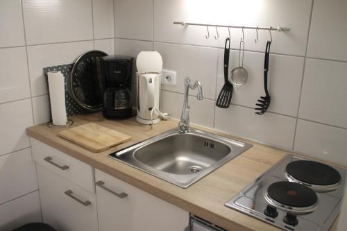 Dapur atau dapur kecil di Apartmenthaus Jörn