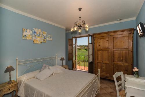 Postel nebo postele na pokoji v ubytování Agriturismo Ai Linchi