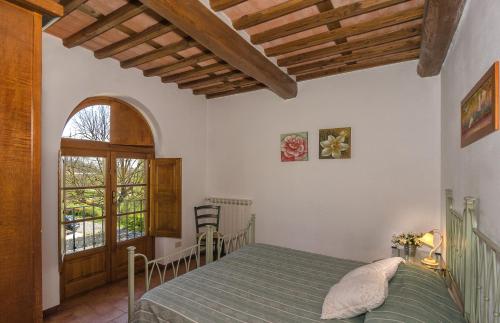 Postel nebo postele na pokoji v ubytování Agriturismo Ai Linchi