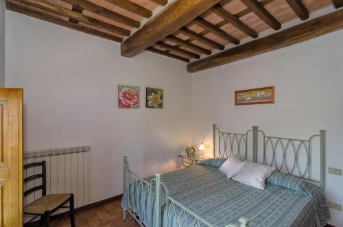Postel nebo postele na pokoji v ubytování Agriturismo Ai Linchi