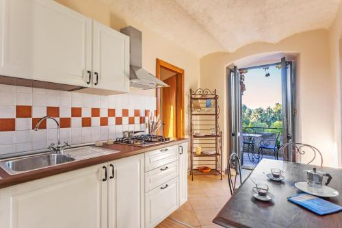 a kitchen with a sink and a counter top at Torre S.Antonio in Santa Caterina dello Ionio