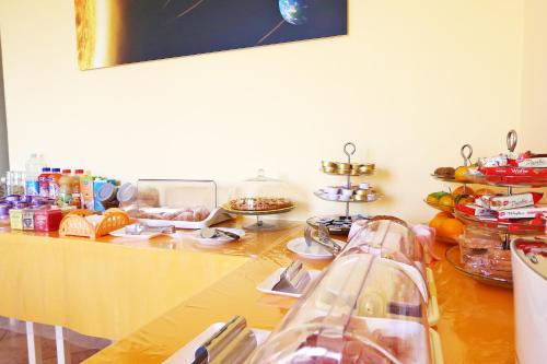 a table with food on top of it at Kosmos in Siracusa