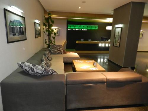 Zona de estar de ApartHotel Calypso in Orbi