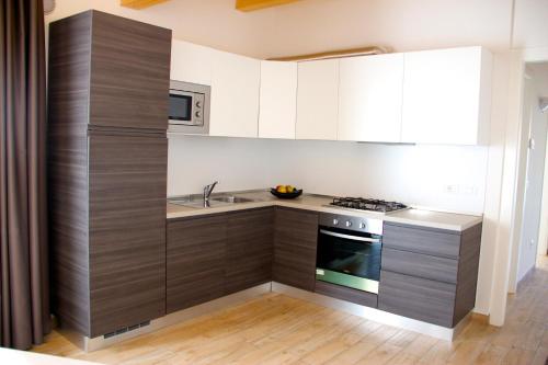 Dapur atau dapur kecil di Residence la Perla