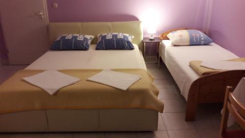 Ένα ή περισσότερα κρεβάτια σε δωμάτιο στο Guesthouse Ivan