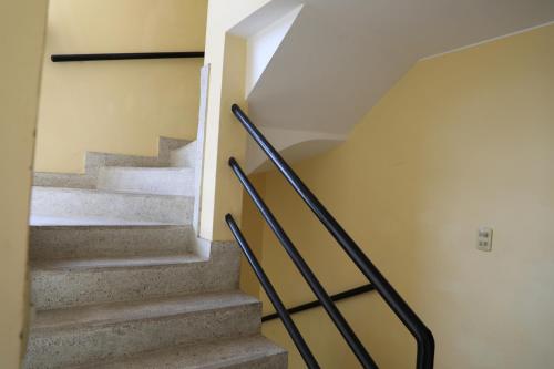 a set of stairs in a house at Edificio Juana Chorrillos in Lima