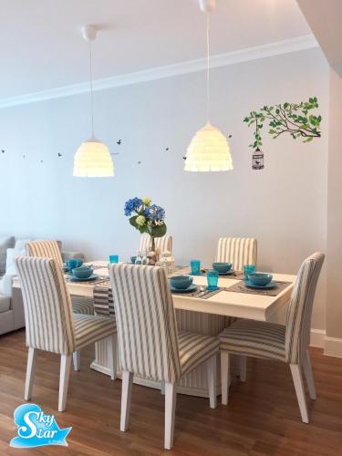 a dining room with a table and chairs at My Resort Hua Hin by Skystar in Hua Hin