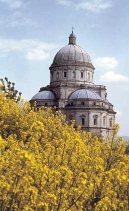 a building with a dome on top of a tree at Villa Luisa in Todi