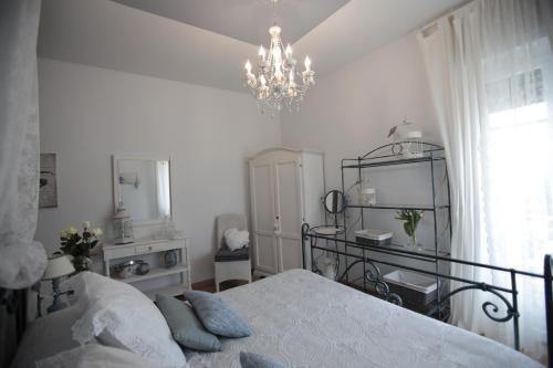 Кровать или кровати в номере B&B La Casa di Pamela