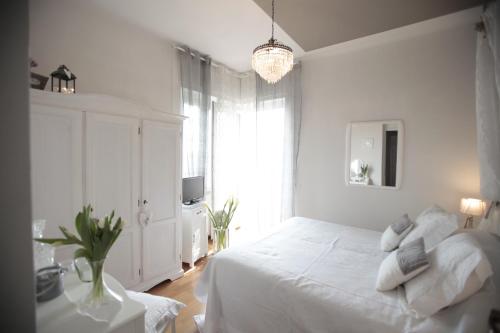 Кровать или кровати в номере B&B La Casa di Pamela