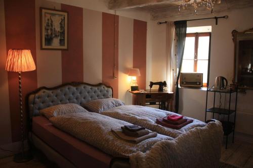 Cama o camas de una habitación en Affittacamere Casa Archi