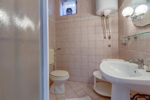 Kúpeľňa v ubytovaní Apartman Haraciceva
