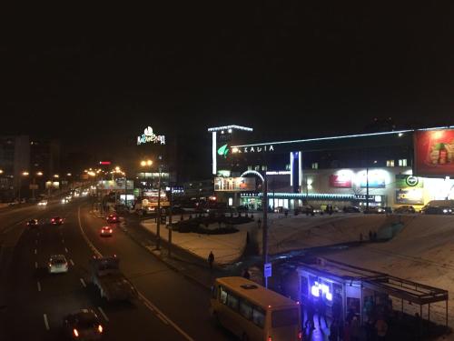 a city street filled with lots of traffic at night at WHotel Kyiv in Kyiv