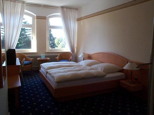Lova arba lovos apgyvendinimo įstaigoje Hotel-Restaurant Pfeffermühle