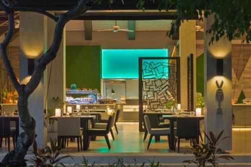 Restaurant o un lloc per menjar a Velassaru Maldives