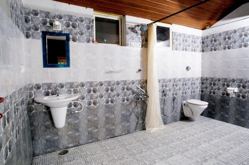 Phòng tắm tại Rock Haven Wayanad