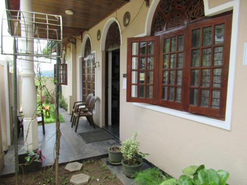 En balkon eller terrasse på Expeditor Kandy
