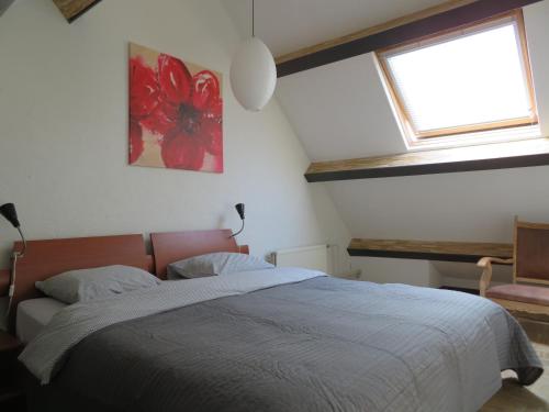 Postel nebo postele na pokoji v ubytování B&B Eeneind