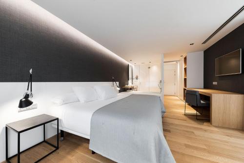Postel nebo postele na pokoji v ubytování Hotel U Viveiro