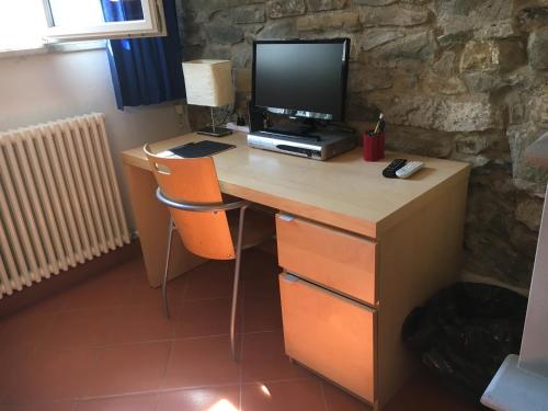 A television and/or entertainment centre at Old Town in the green: Federico's apartment.