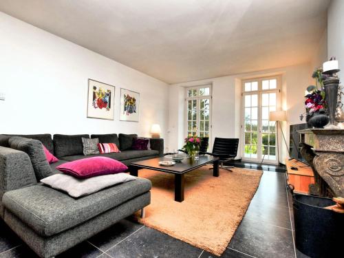 A seating area at Charming holiday home in Ardennes and large garden