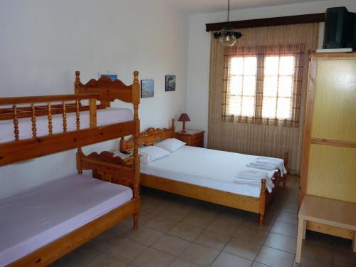 Ένα ή περισσότερα κρεβάτια σε δωμάτιο στο Villa Oasis