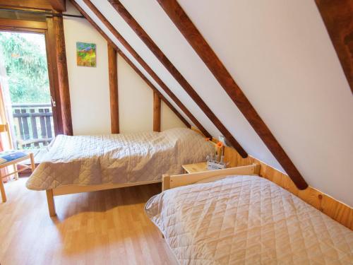 Spacious Holiday home in Feriendorf Frankenau near Forestにあるベッド