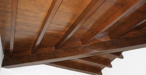 a close up of a wooden ceiling at B&B Martina in Assemini