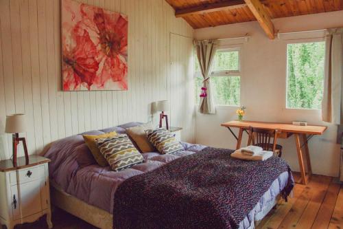 Postel nebo postele na pokoji v ubytování Casa Pocahullo