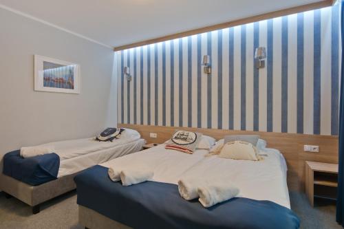 Ένα ή περισσότερα κρεβάτια σε δωμάτιο στο B&B Molo