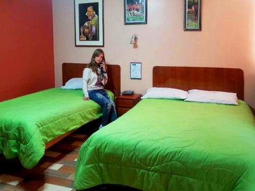 Ένα ή περισσότερα κρεβάτια σε δωμάτιο στο Hotel Las Lomas