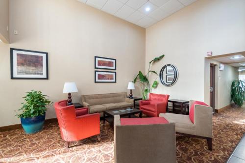 a waiting room at a hospital with chairs and tables at Econo Lodge Hagerstown I-81 in Hagerstown