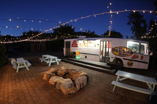 a food truck parked in a parking lot at night at Adventure Inn Marahau in Marahau