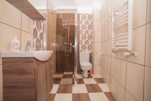 Ванная комната в Noclegi Andersa