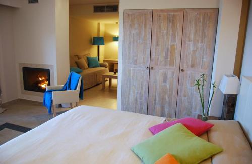 Postel nebo postele na pokoji v ubytování Astrolabe Hotel