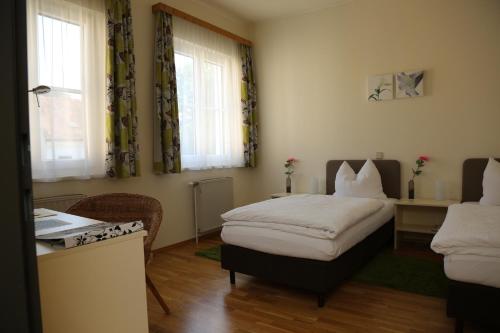 Postel nebo postele na pokoji v ubytování Babenbergerhof