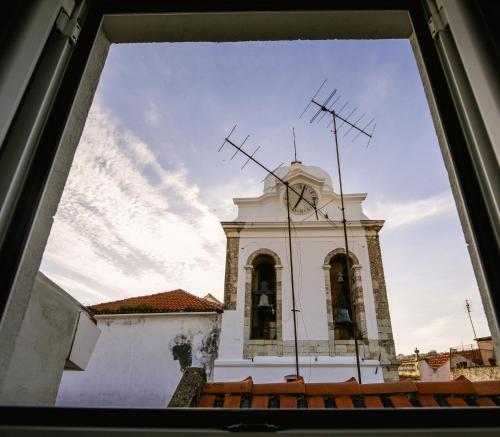 Фотография из галереи De Pedra e Sal Hostel & Suites в Сетубале