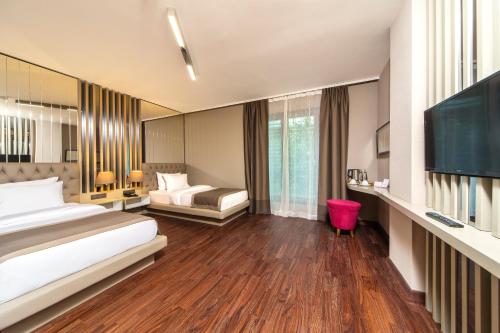Μια τηλεόραση ή/και κέντρο ψυχαγωγίας στο The City Suites