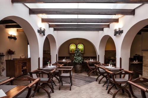 Restaurant o un lloc per menjar a Excalibur Penzion a Restaurace
