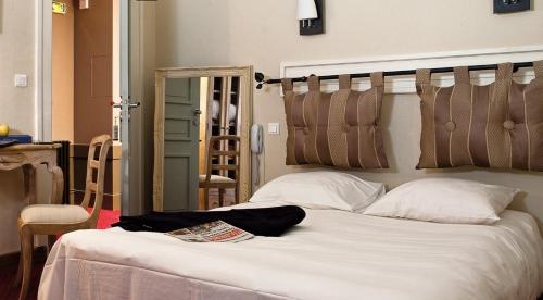 Cama o camas de una habitación en L'Etoile d'Or