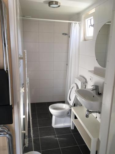 Ванная комната в Huisje 19 Zoutelande