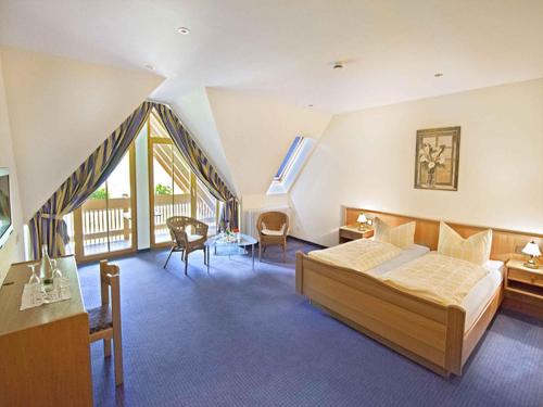 Postel nebo postele na pokoji v ubytování Hotel Walkenstein