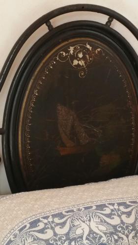a picture of a painting on a wall at Palazzo Lagioia in Triggiano