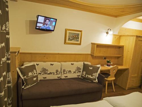 TV a/nebo společenská místnost v ubytování Hotel El Paster